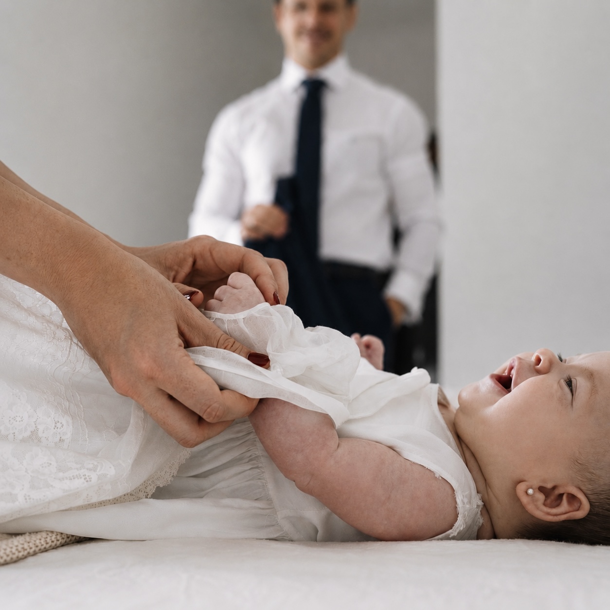 La primera sonrisa del bebé el día del bautizo